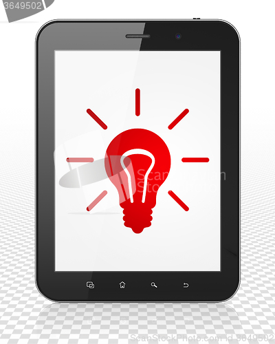 Image of Finance concept: Tablet Pc Computer with Light Bulb on display