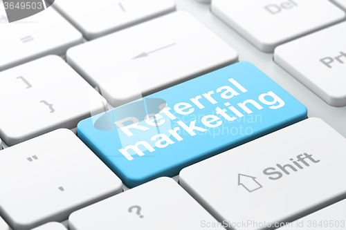 Image of Advertising concept: Referral Marketing on computer keyboard background