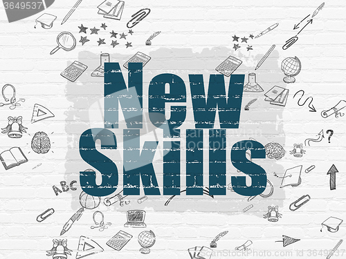 Image of Learning concept: New Skills on wall background