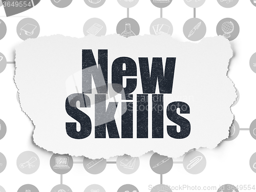 Image of Education concept: New Skills on Torn Paper background