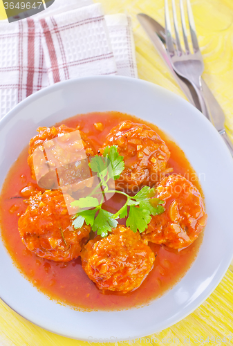 Image of meat ball with tomato sauce