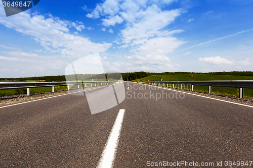 Image of Summer road . field