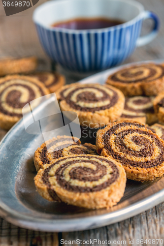 Image of Two-color cookies on a metal tray.