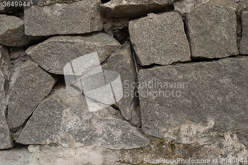 Image of gray stone wall close-up