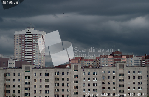 Image of gray clouds over the urban landscape