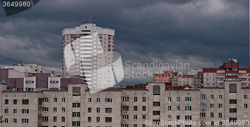 Image of gray clouds over the urban landscape