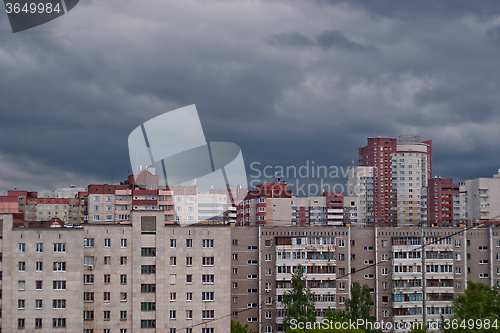 Image of gray clouds over the urban landscape