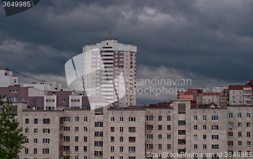 Image of gray clouds over the urban landscape