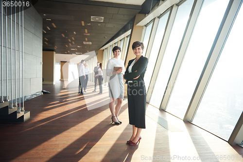 Image of business people group, females as team leaders