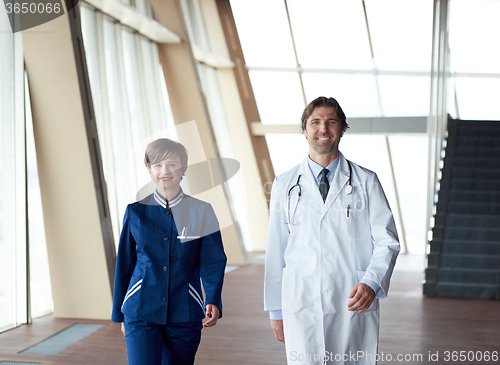 Image of doctors team walking