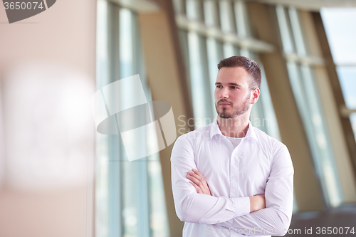 Image of business man with beard at modern office