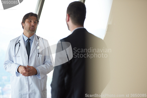 Image of doctor handshake with a patient