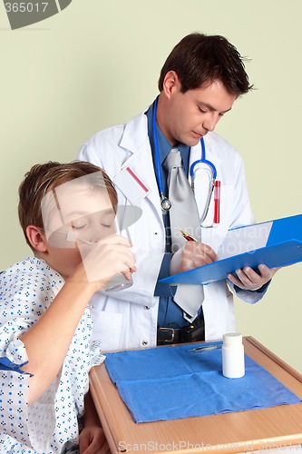 Image of Sick child taking medicine