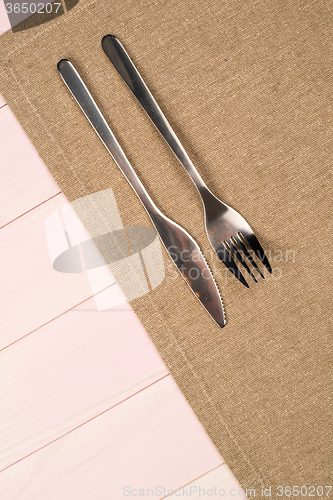 Image of Kitchenware on beige towel