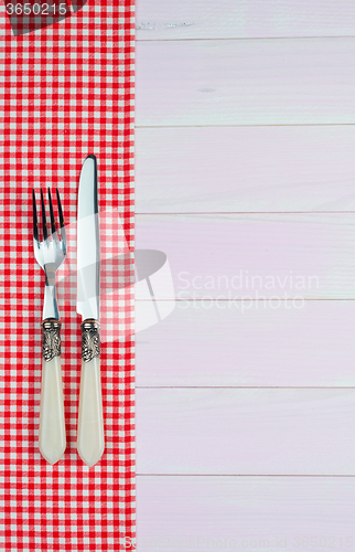 Image of Kitchenware on red towel