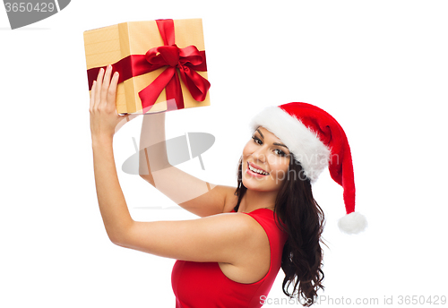 Image of beautiful sexy woman in santa hat with gift box