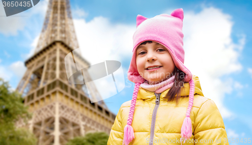 Image of happy little girl over eiffel tower in paris