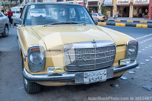 Image of Old vehicle parking on Sheraton street. Hurghada, Egypt