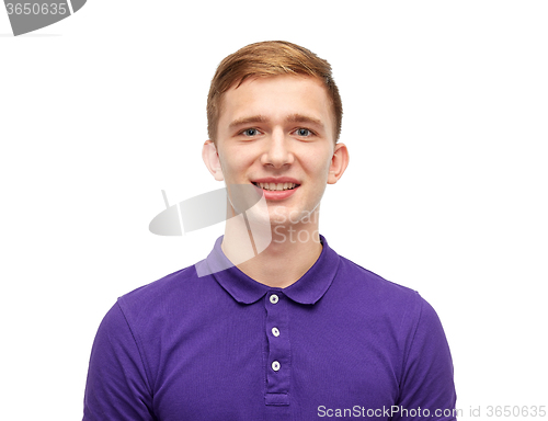 Image of smiling young man in purple polo t-shirt