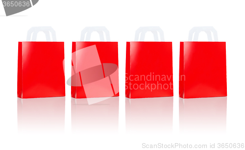 Image of many blank red shopping bags