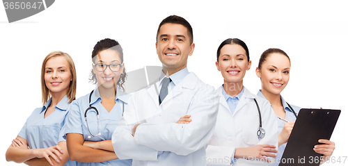 Image of group of smiling doctors with clipboard