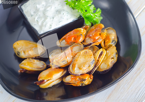 Image of mussels with sauce