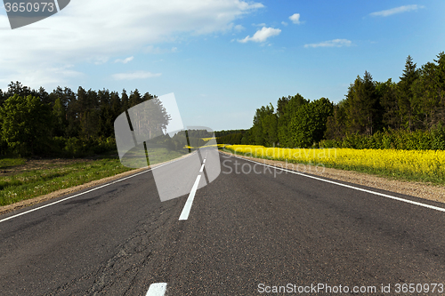 Image of rural road .  canola