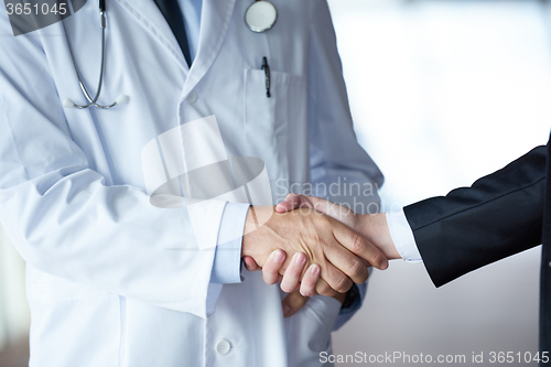 Image of doctor handshake with a patient