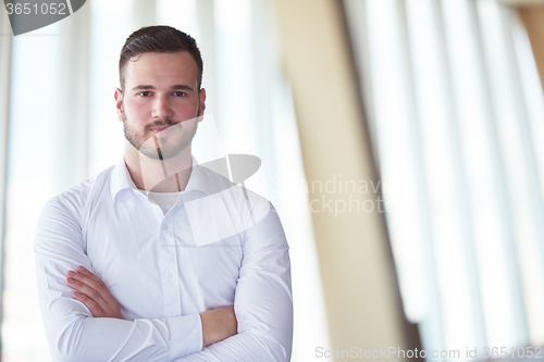 Image of business man with beard at modern office
