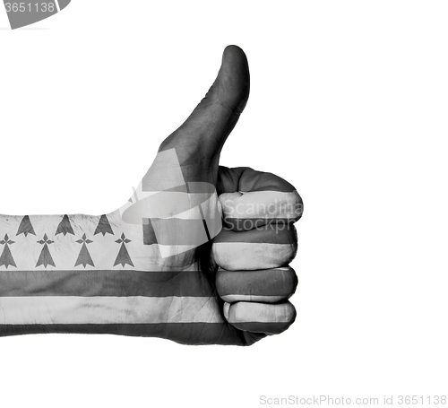 Image of Closeup of male hand showing thumbs up sign