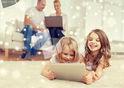 Image of happy family with tablet pc computers