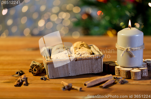 Image of close up of christmas oat cookies on wooden table