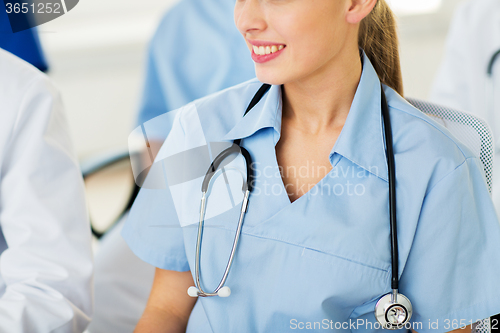 Image of close up of doctor with stethoscope at seminar