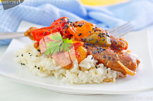 Image of boiled rice with meat and vegetables