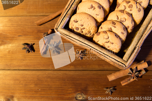 Image of close up of oat cookies on wooden table