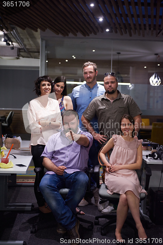 Image of portrait of business team at modern office