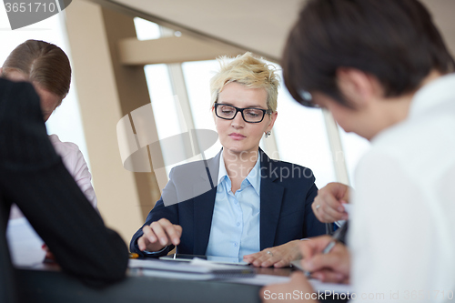 Image of business people group on meeting at office