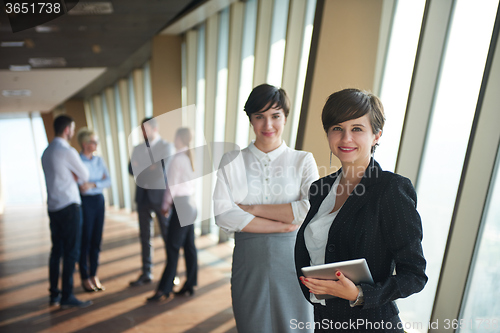 Image of business people group, females as team leaders