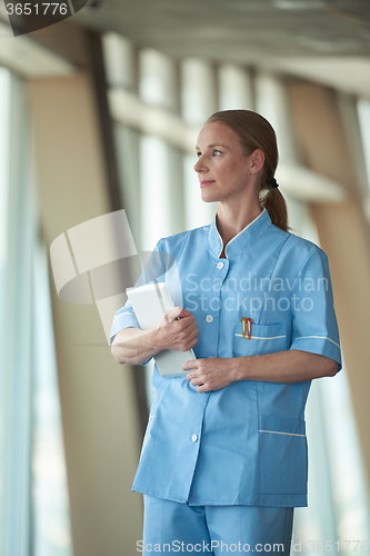 Image of female doctor with tablet computer