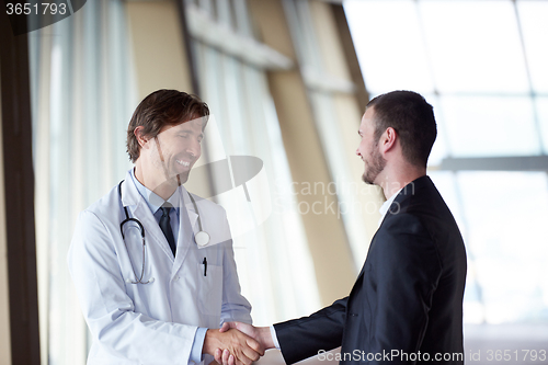 Image of doctor handshake with a patient