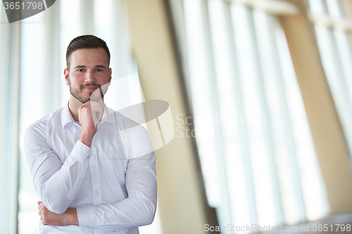 Image of business man with beard at modern office