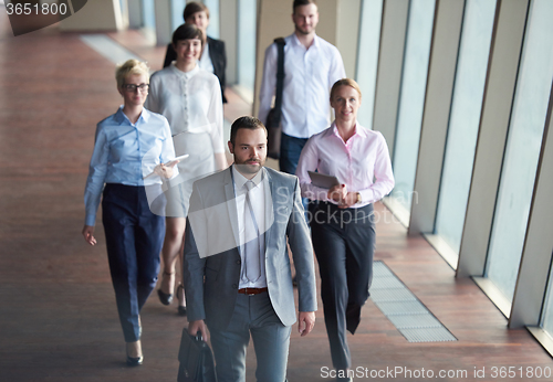 Image of business people group walking