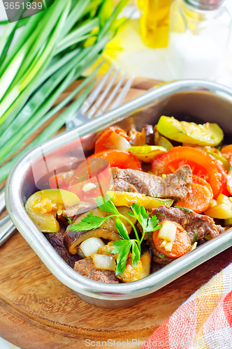 Image of baked meat with vegetables