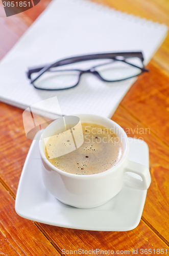 Image of coffee and note