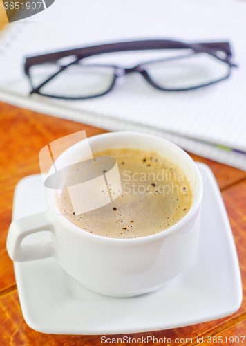 Image of coffee and note