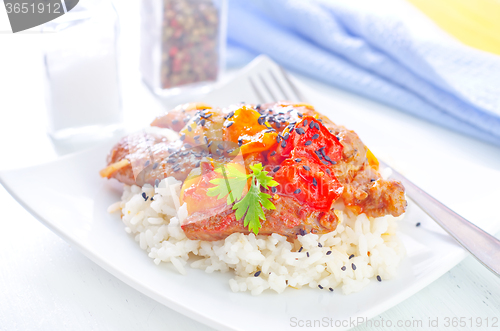 Image of boiled rice with meat and vegetables