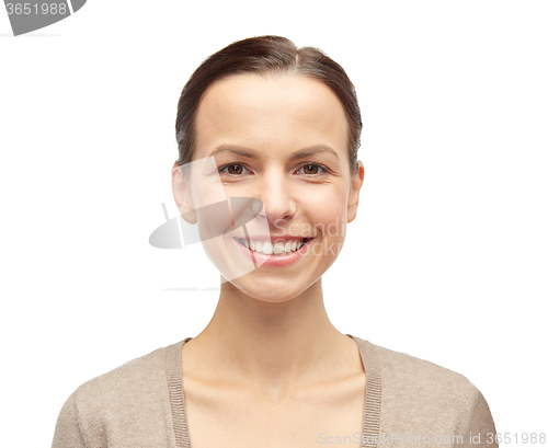 Image of smiling young woman in cardigan