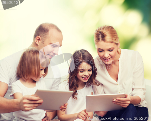 Image of happy family with tablet pc computers