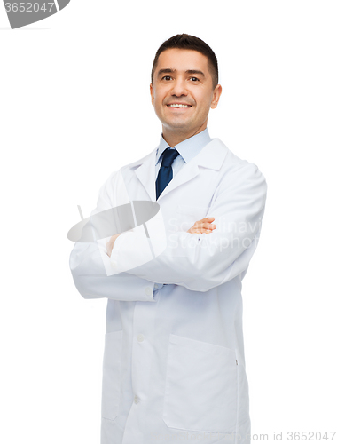 Image of smiling male doctor in white coat