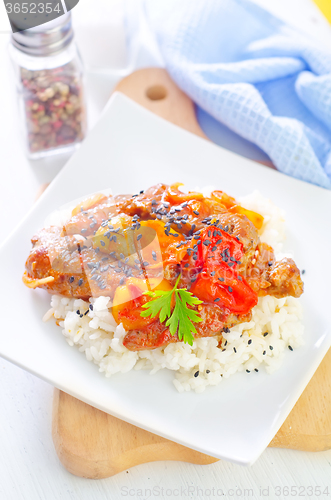 Image of boiled rice with meat and vegetables